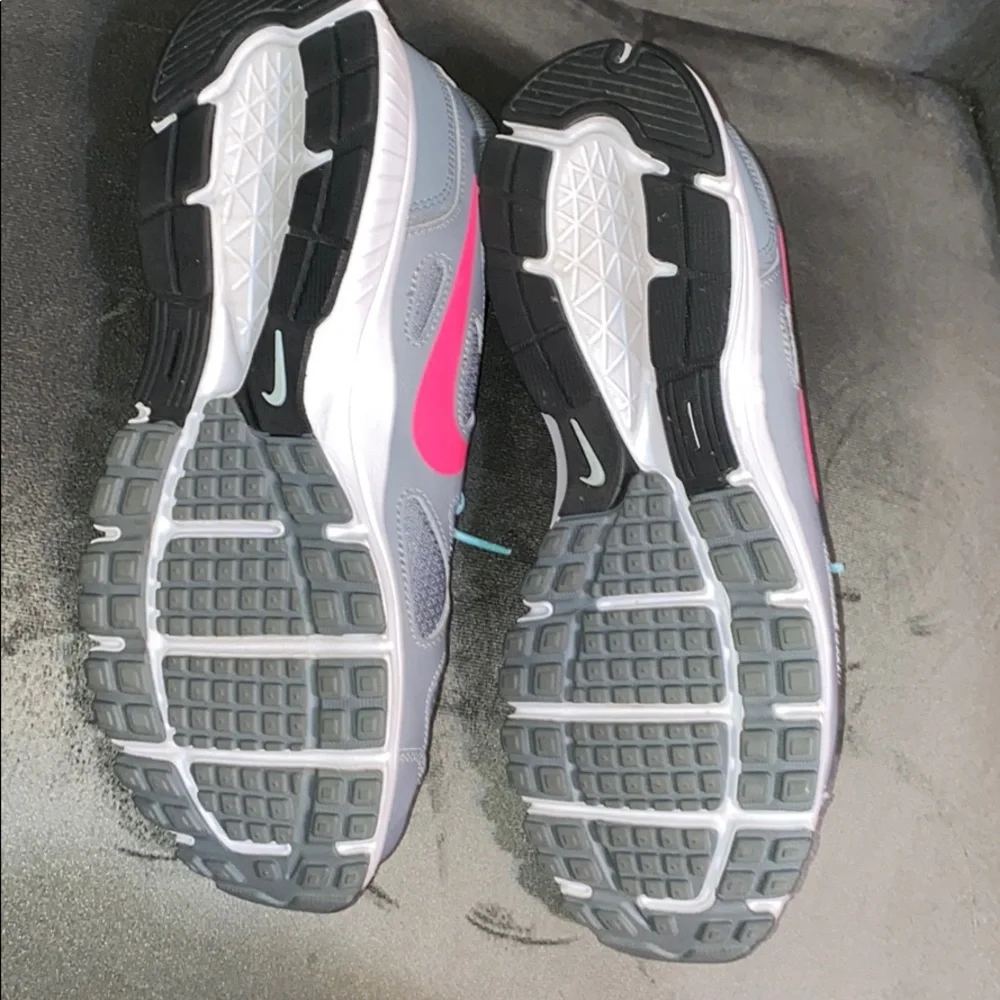Nike Women’s Gray Athletic Shoes with Pink Swoosh and Light Blue Accents
